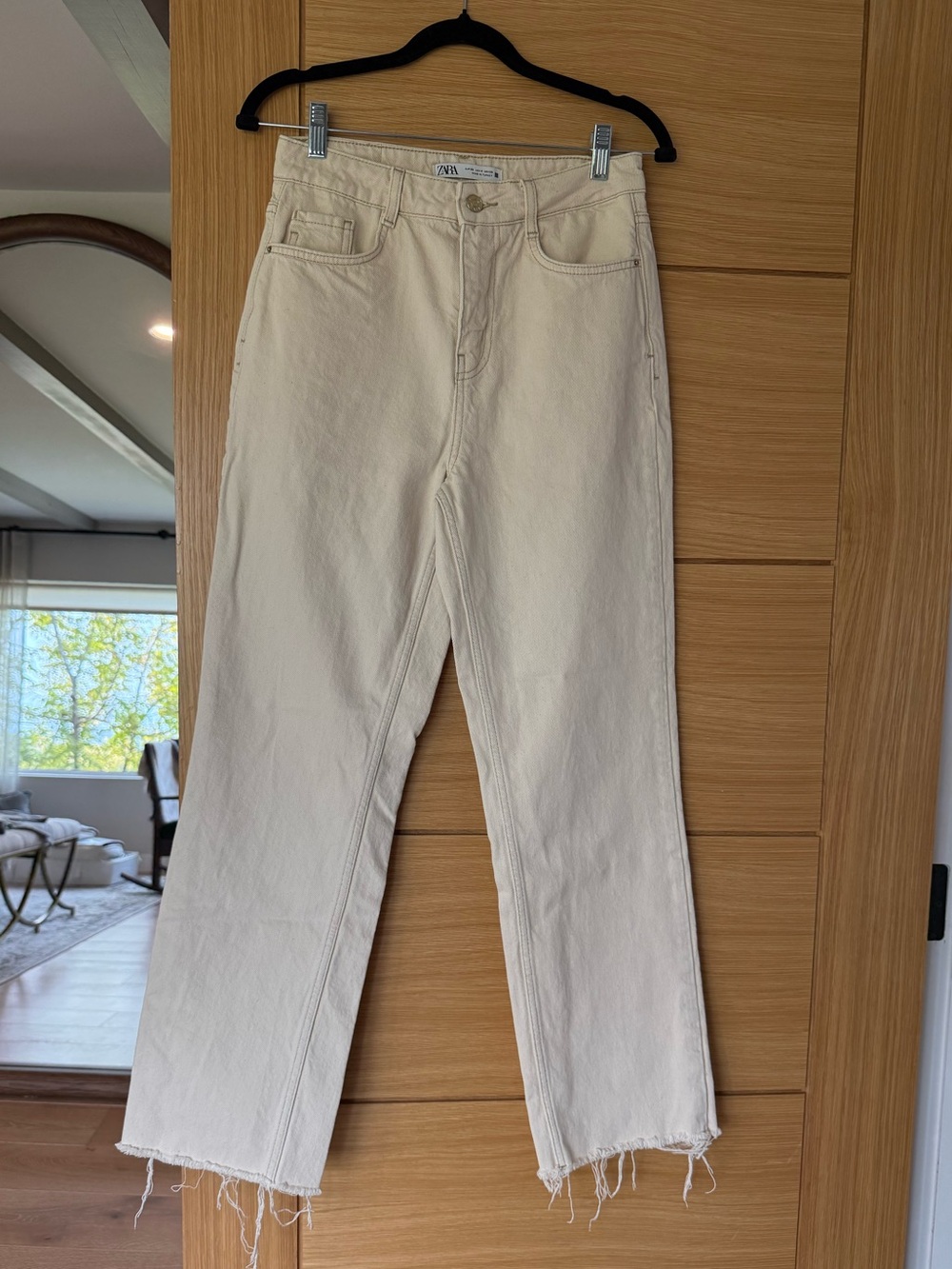 Cream colored high waisted jeans size 4